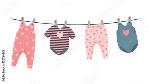 baby clothes hanging on clothesline