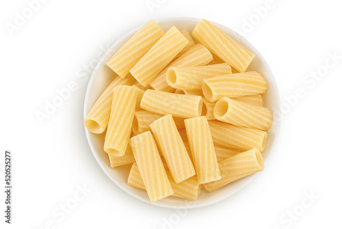 raw italian tortiglioni pasta in ceramic bowl isolated on white background with full depth of field. Top view. Flat lay