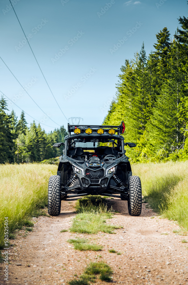 UTV in the woods dirty from mud UTV in the woods dirty from mud