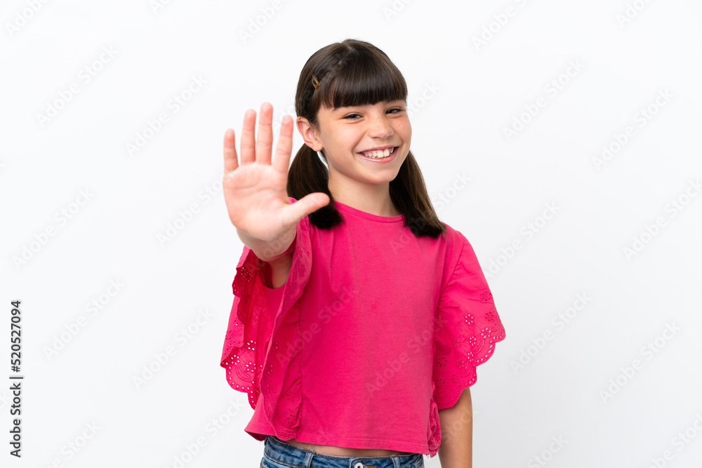 Fototapeta premium Little caucasian kid isolated on white background counting five with fingers