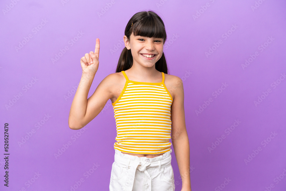 Little caucasian kid isolated on purple background pointing up a great idea Little caucasian kid isolated on purple background pointing up a great idea