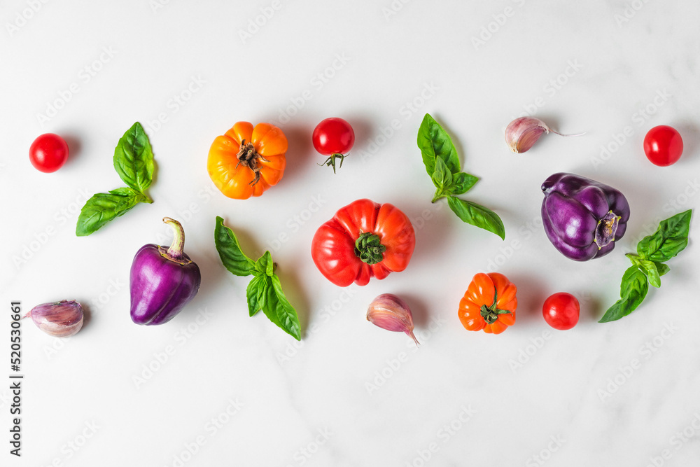 Food composition. Creative layout made of organic vegetables and basil on white background. Top view