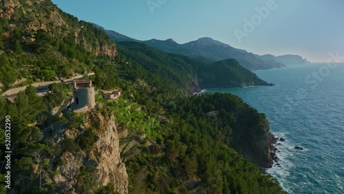 Beautiful aerial view of Torre de Verger in Banyalbufar, tourist city of Mallorca, Drone, Es Port des Canonge, Serra de Tramuntana , Spain