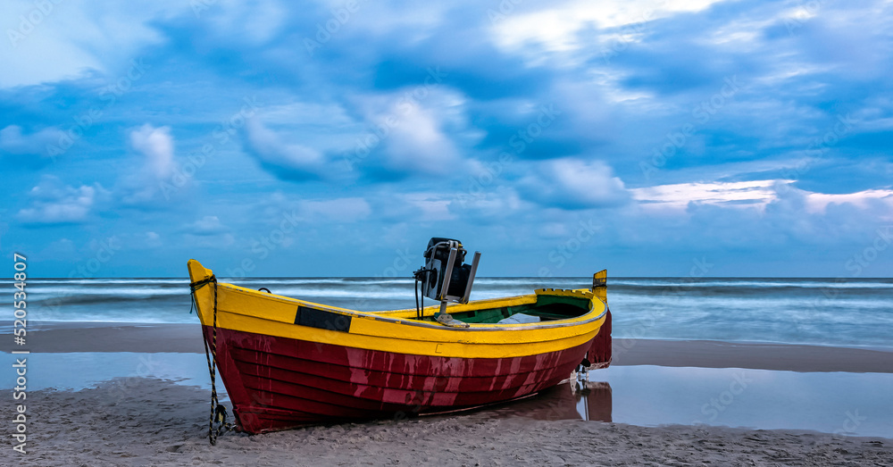 Fishing boat on Polish beach - Debki, Pomerania, Poland Fishing boat on Polish beach - Debki, Pomerania, Poland