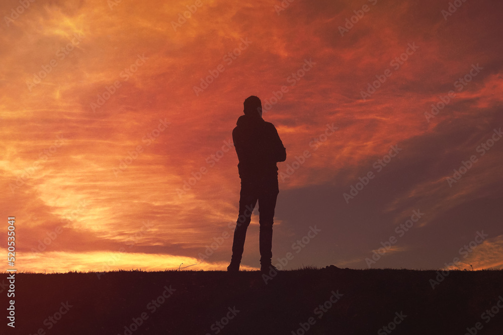 man trekking in the mountain with a beautiful sunset background, Bilbao, Basque country, Spain man trekking in the mountain with a beautiful sunset background, Bilbao, Basque country, Spain
