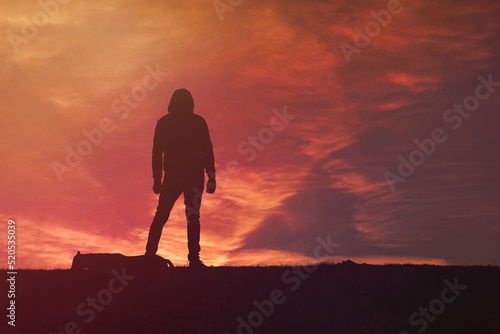 man trekking in the mountain with a beautiful sunset background, Bilbao, Basque country, Spain