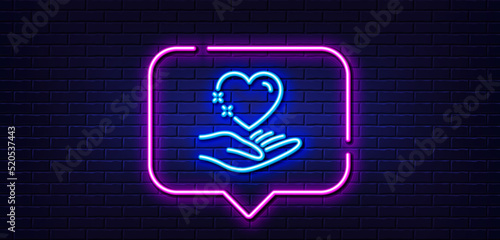 Neon light speech bubble. Hold heart line icon. Care love emotion sign. Valentine day symbol. Neon light background. Hold heart glow line. Brick wall banner. Vector