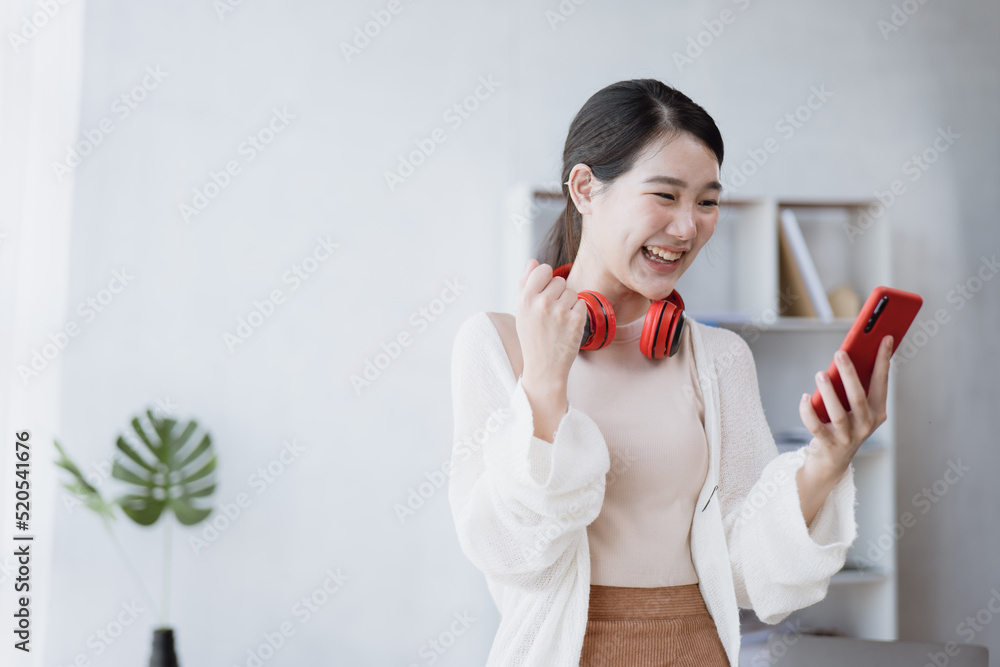 Business woman happy and cheerful for successful on project via mobile phone in office space. Business woman happy and cheerful for successful on project via mobile phone in office space.