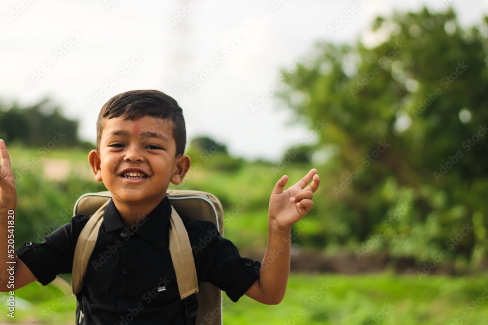 Young smiling happy male kid school boy 5-6 years old in shirt backpack look camera outdoor view,childhood children kids education lifestyle concept. Young smiling happy male kid school boy 5-6 years old in shirt backpack look camera outdoor view,childhood children kids education lifestyle concept.