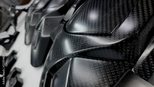 Close up view of carbon fiber material of composite make automotive part racing