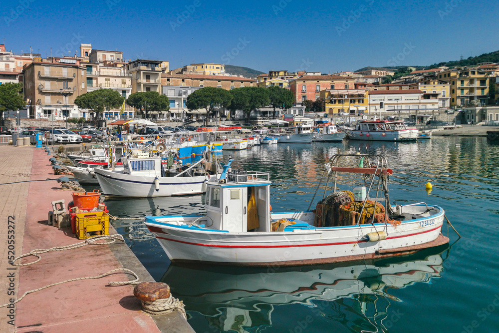 Obraz premium Colorful fishing boats moored at Marina di Camerota port, Campania region, Italy