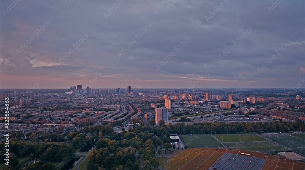 Drone photograph of The Hague Netherlands, showing the sport campus at the zuiderpark and the skyline at sunset