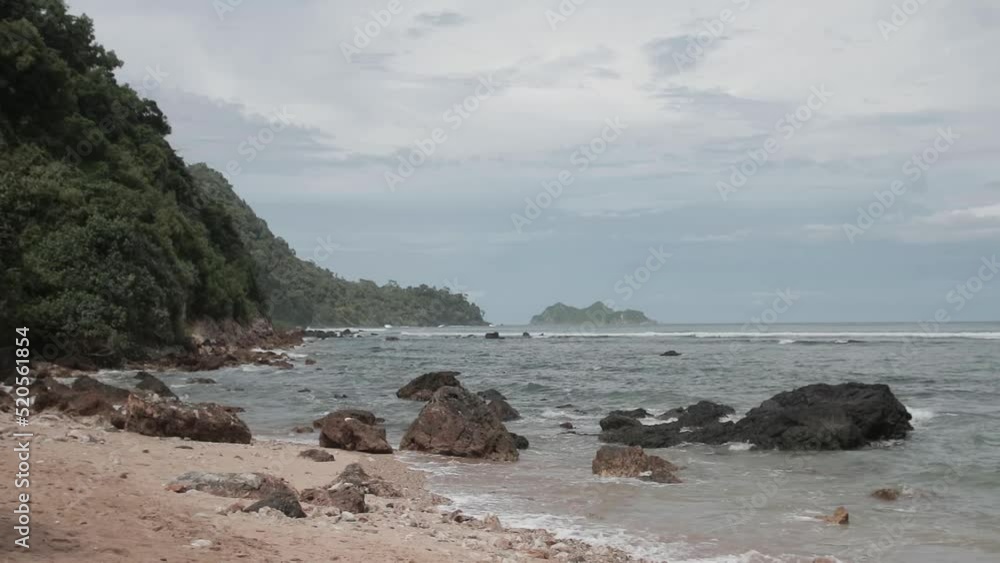 sea video with big waves with big rocks, blue sky, indonesian sea sea video with big waves with big rocks, blue sky, indonesian sea