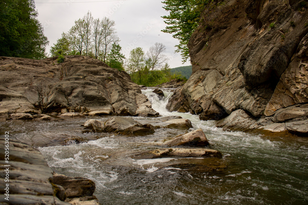 Fototapeta premium Waterfall on a mountain river in Sheshory