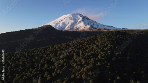 Aerial view of the rocky , snowy Iztaccihuatl volcanic mountain in Mexico in 4K photo
