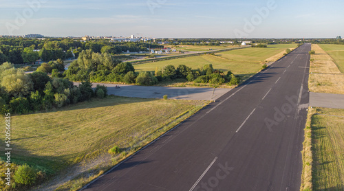 Aerial view from plane landing. Runway of former airport in Neubiberg, south Germany seen from above