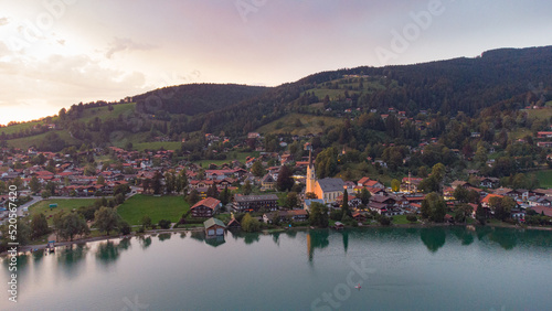 Typical Bavarian town in a colorful evening seen from drone view