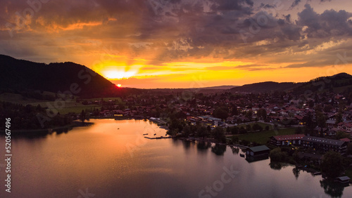 Typical Bavarian town in a colorful evening seen from drone view