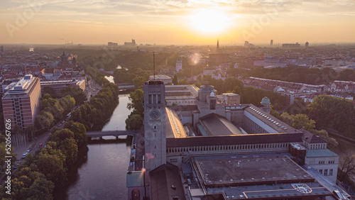 Aerial view of Munich city centre with Isar river flowing past the Deutsches Museum at sunrise