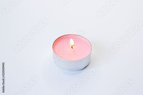red candle on a black background