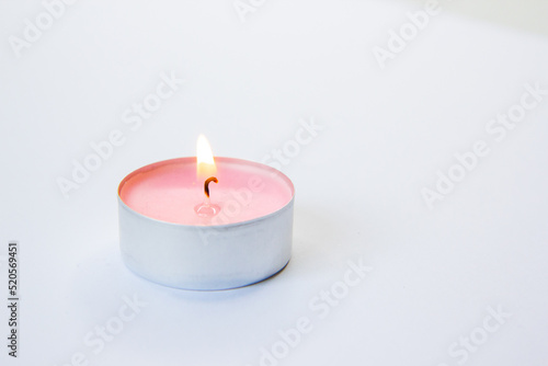 burning candle on a dark background