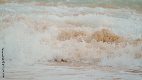 Slow motion shot of rolling waves on Makena Beach, Maui, Hawaii photo