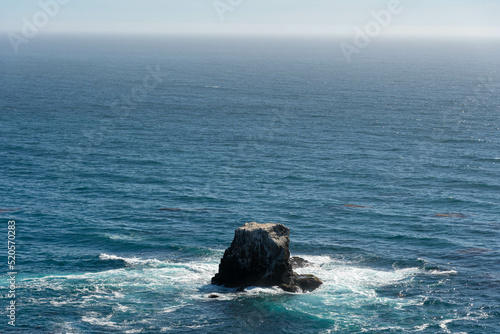 rock in ocean © joshua