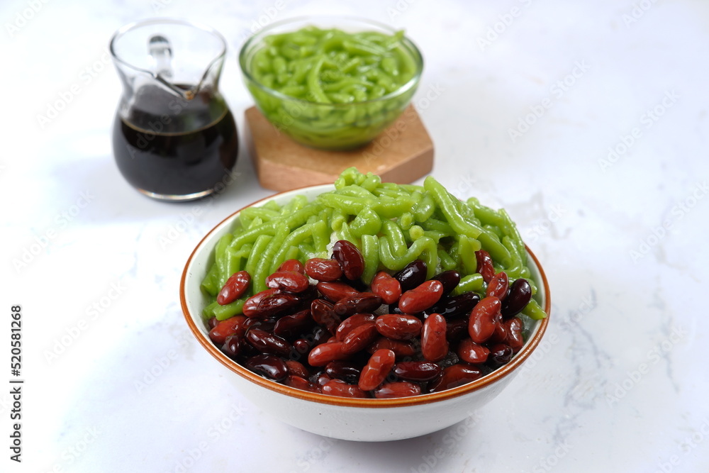 Malaysian Desserts Called Cendol. Cendol is Made From Crushed Ice Cubes,pandan short vermicelli and Red Bean. Malaysian Desserts Called Cendol. Cendol is Made From Crushed Ice Cubes,pandan short vermicelli and Red Bean.