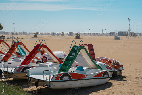 catamarans with an entertaining slide on the beach photo