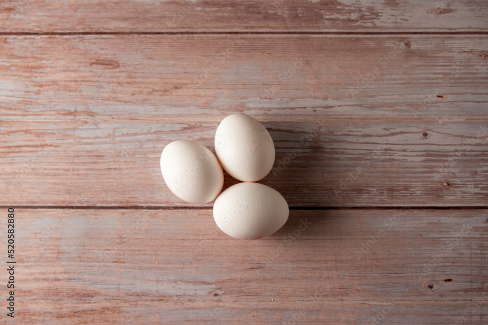 Fresh free range eggs on wooden table Fresh free range eggs on wooden table