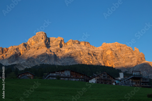View of Conturines Mount at sunset from San Cassiano village in Badia Valley, South Tyrol, Bolzano province, Italy.