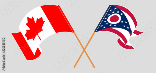 Crossed and waving flags of Canada and the State of Ohio