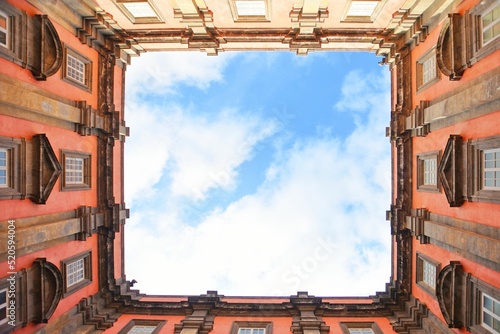 Fototapeta Naklejka Na Ścianę i Meble -  Sky seen from the inner courtyard of the Capodimonte royal palace in Naples, Italy