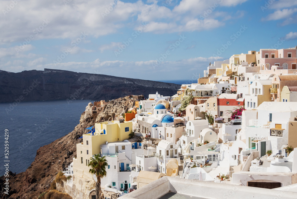 Oia, Greece - October 8, 2021:View of Oia the most beautiful village of Santorini island in Greece during summer.