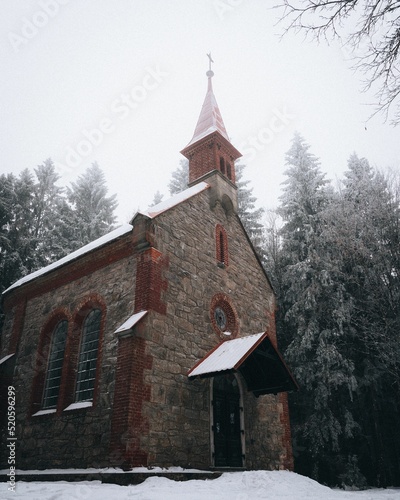 Vertical shot of the Kaple Svate Trojice church in the Mala Morava, Czech Republic photo