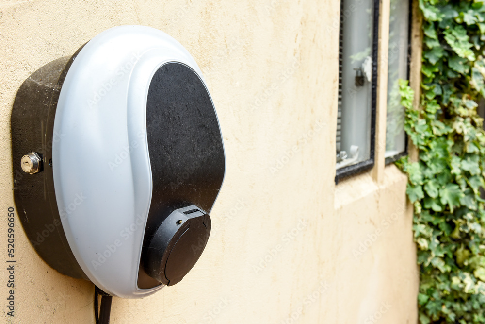 Wall mounted car charging unit to supply power to electric vehicles