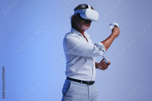 Senior businessman giving a virtual reality presentation