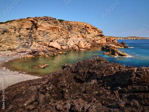 Rocks and sea in long exposure in Menorca, Spain