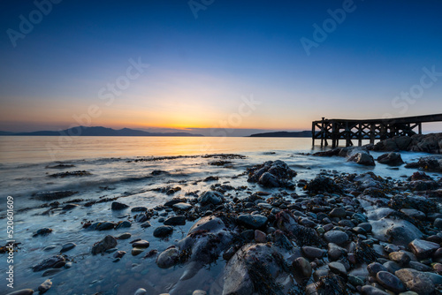 Portencross Beach and pier, Isle of Arran in background, Firth of Clyde, North Ayrshire, Scotland, United Kingdom