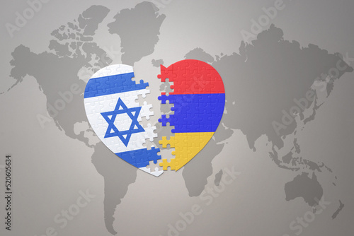 puzzle heart with the national flag of armenia and israel on a world map background.Concept.