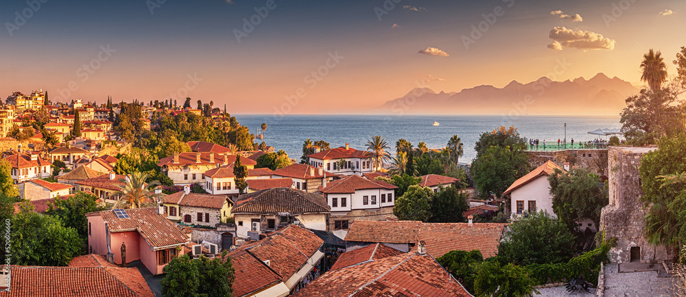 Naklejka premium Panoramic scenic rooftop cityscape view of Antalya resort old town and blue sea in the background.