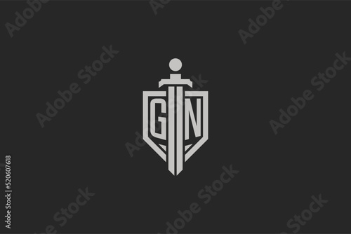 Letter GN logo with shield and sword icon design in geometric style photo