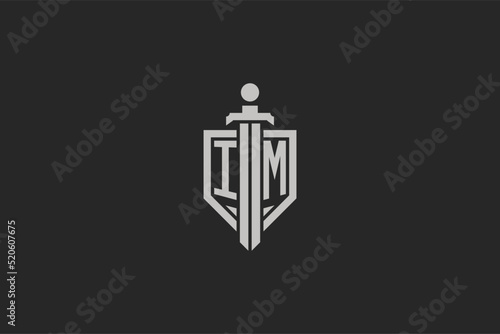 Letter IM logo with shield and sword icon design in geometric style
