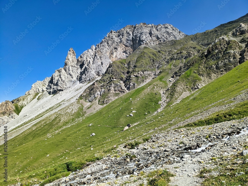 hiking in the beautiful uri alps. Wanderlust Switzerland. Fisetenpass Gesfairenstock and Urnerboden. High quality photo