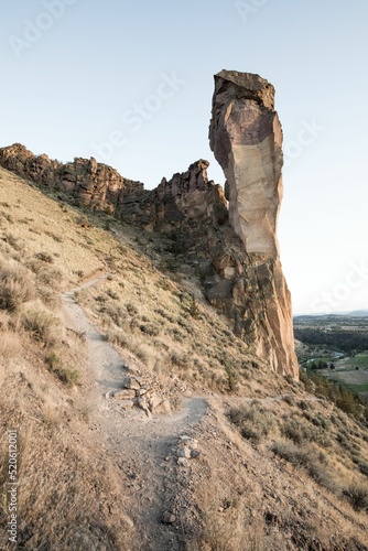 Vertical shot of cliffs of the Smith Rock State Park in Deschutes County, Oregon photo