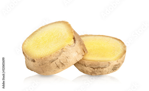 Ginger isolated on white background. Cut slices of ginger root