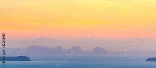 Mountain sunset landscape on sunset sea with colorful sunset sky