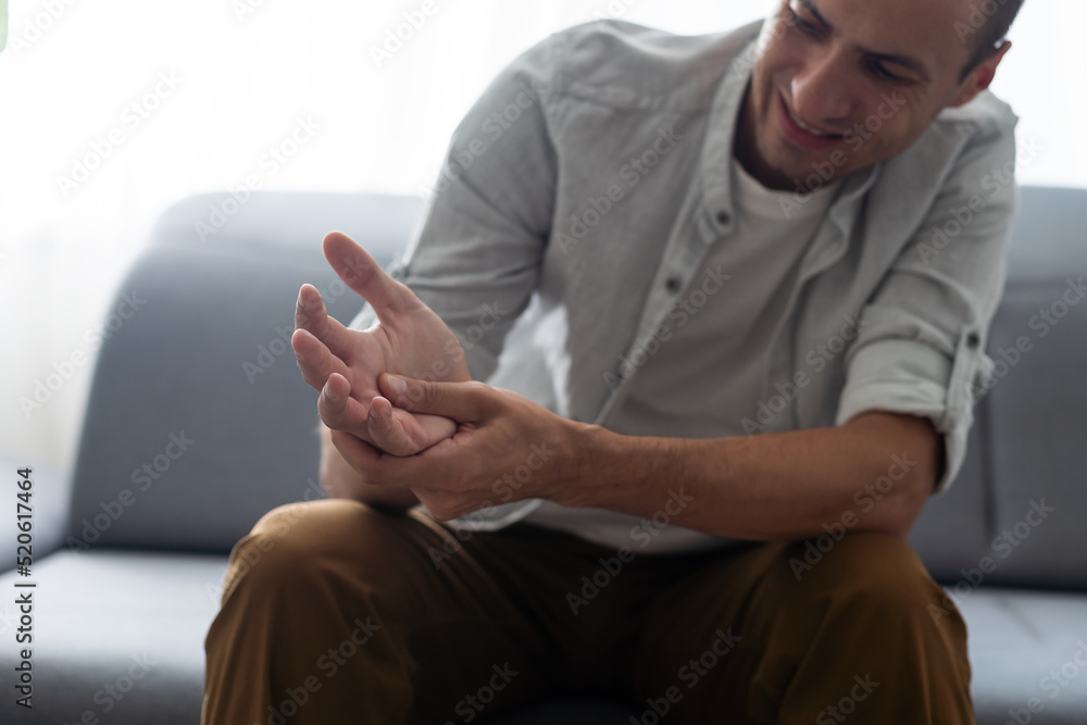 Man's arm pain, human arm anatomy Man's arm pain, human arm anatomy