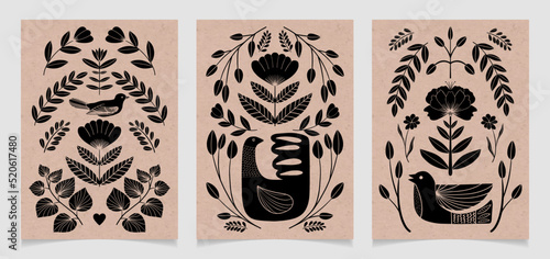 Set of symmetrical ornament with bird, flowers and leaves with different folk compositions. Motif in scandinavian style. Ethnic flat illustration with paper texture in black. photo