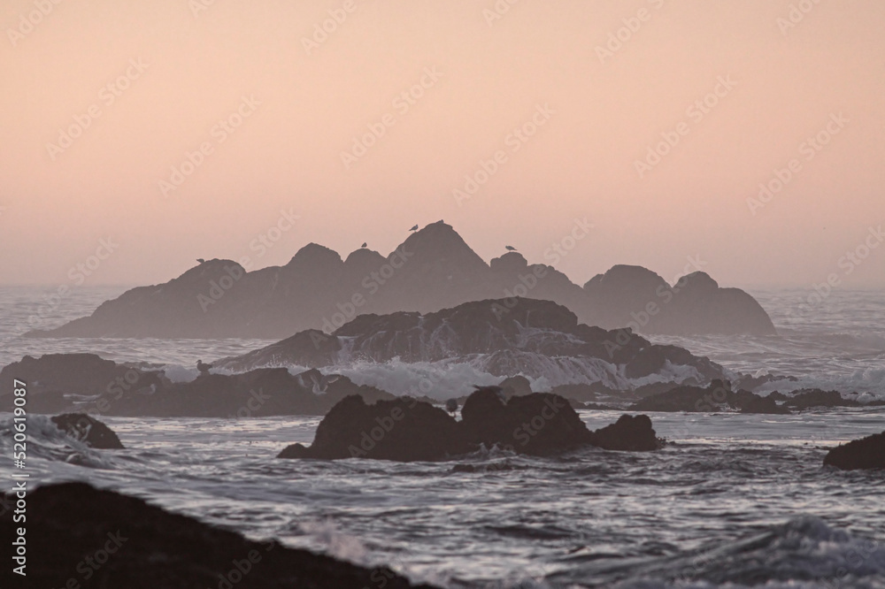 Rocky seascape at dusk